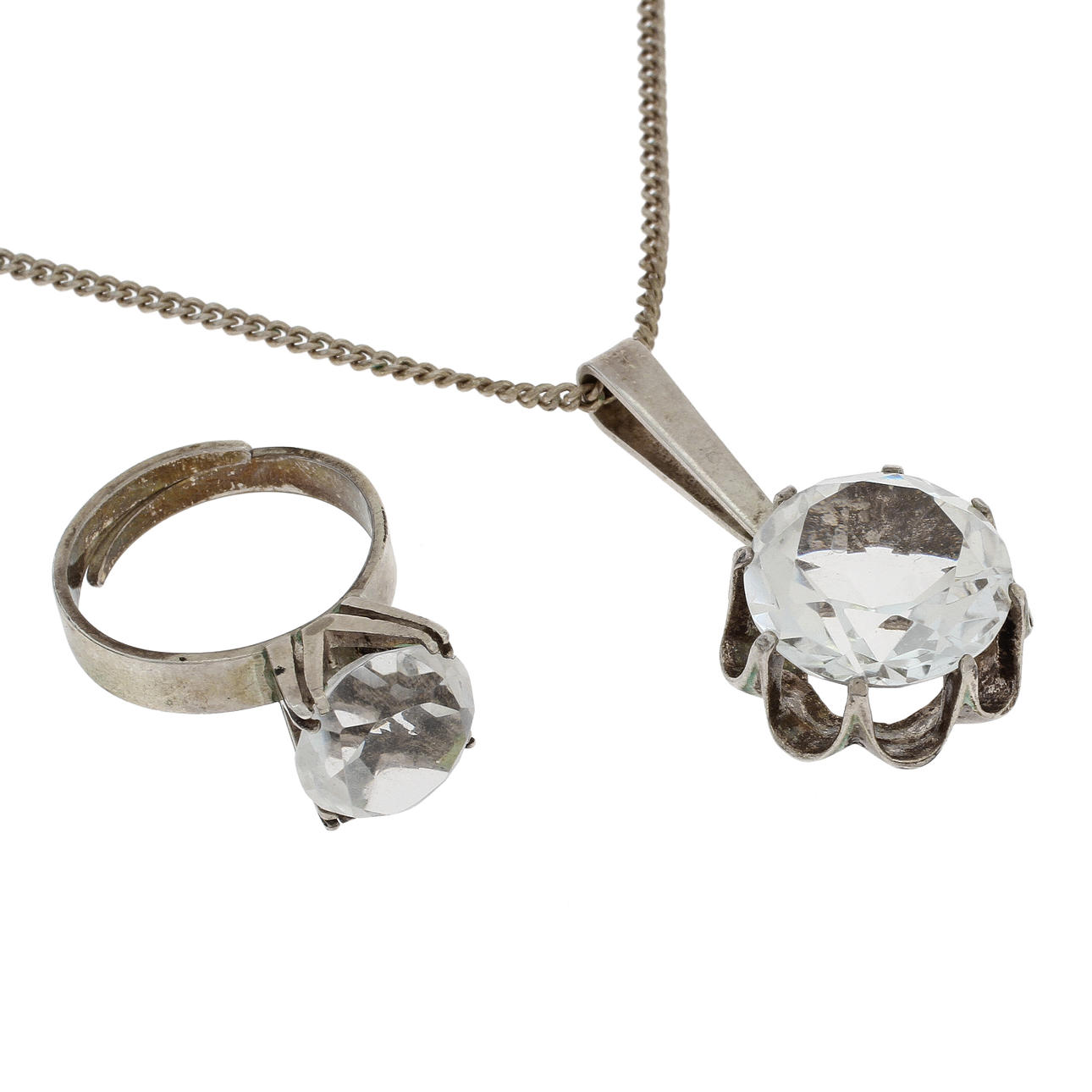 HÄNGE OCH RING, silver och bergkristall, Bengt Hallberg, Köping 1974.