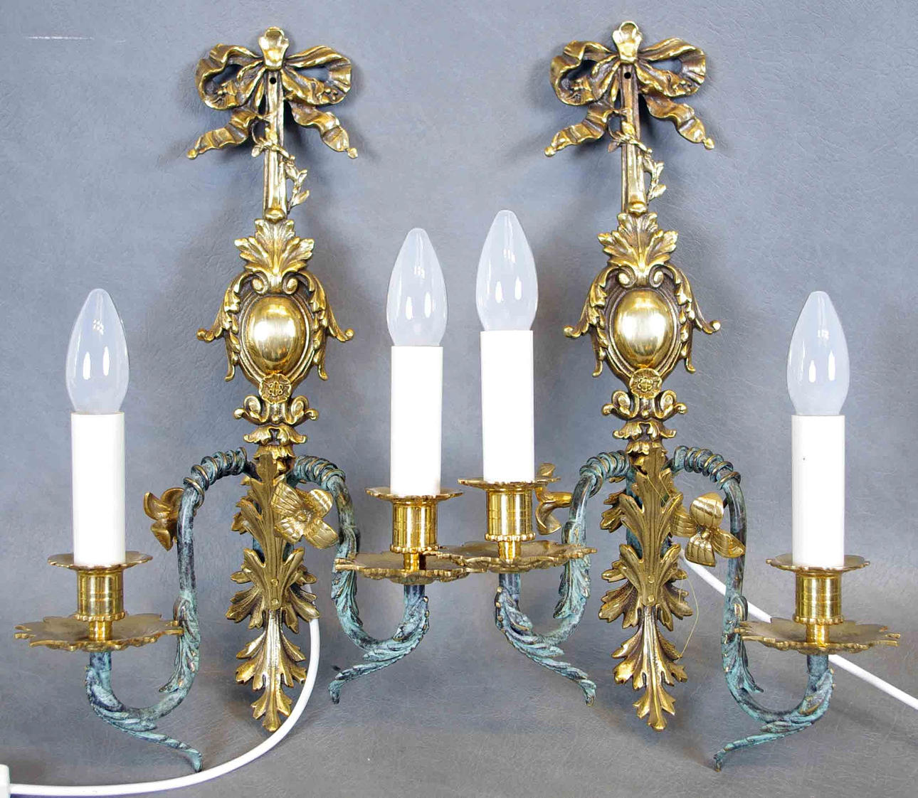 DANIEL MÖLLER. VÄGGLAMPETTER, 1 par 2-armade, rokokostil.