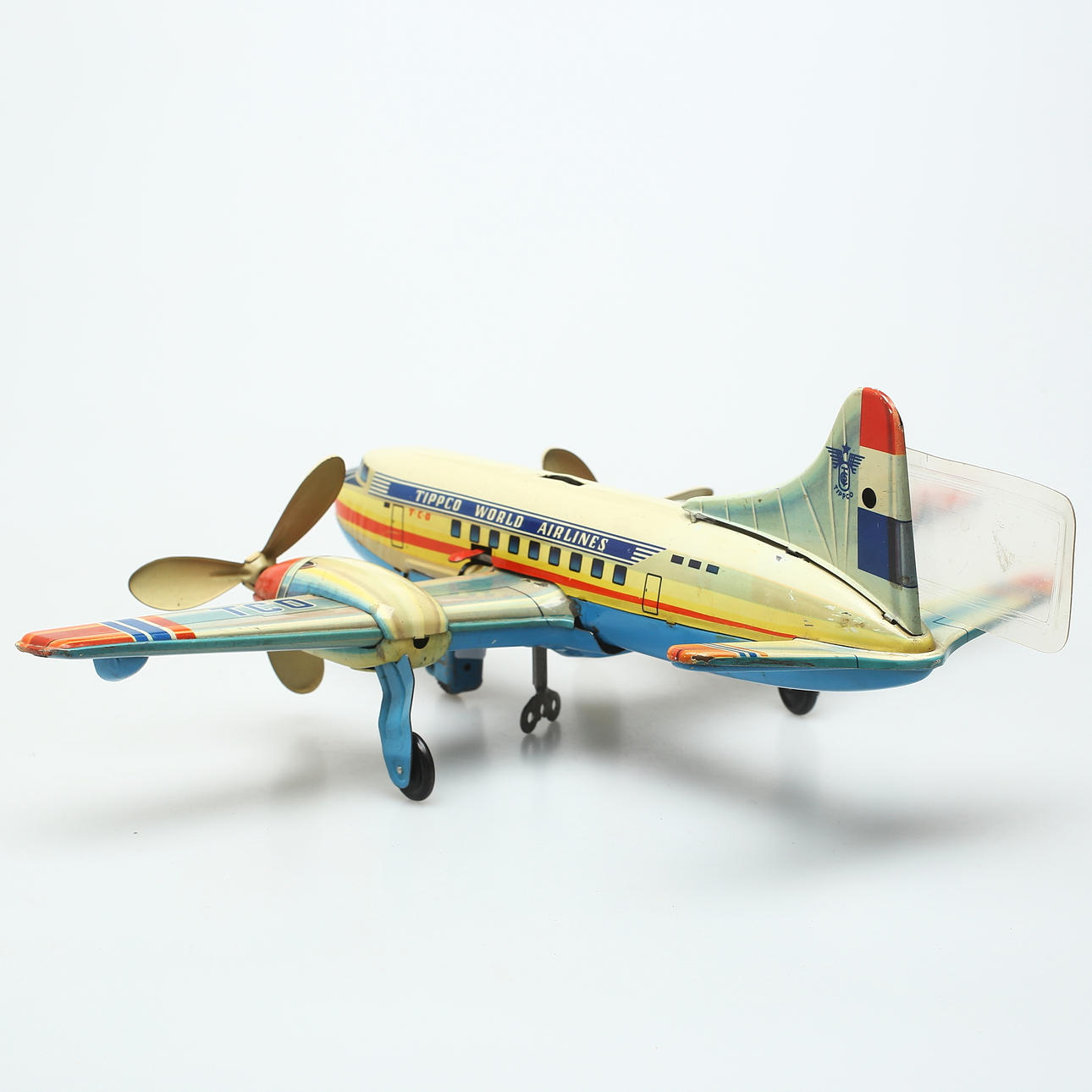JOUET ANCIEN TIPPCO Tco 60 Avion Tole Mecanique World Airlines Vers