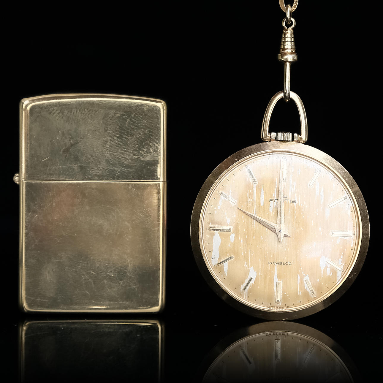 TASCHENUHR und FEUERZEUG, Zippo.