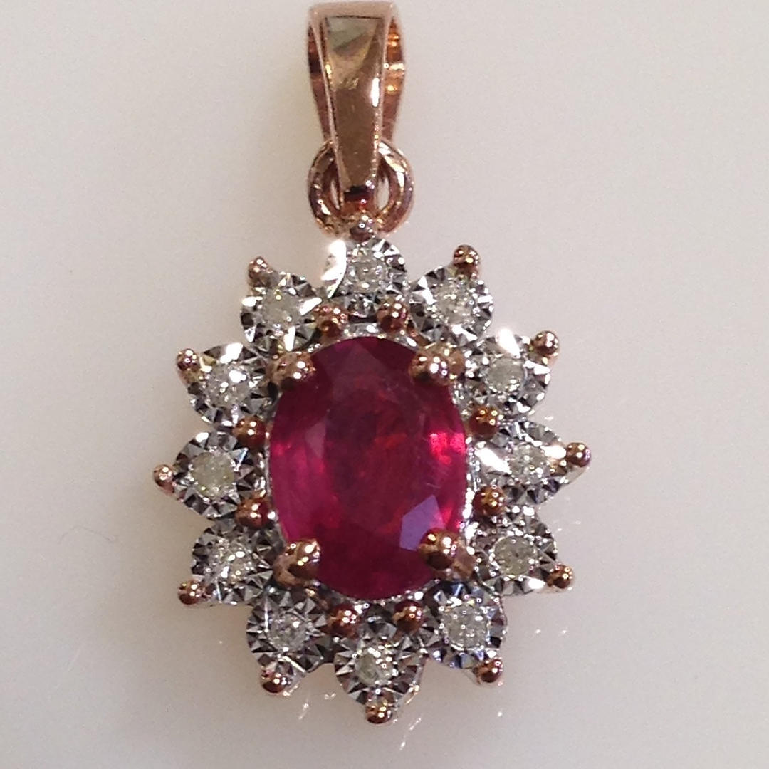 RUBY AND DIAMOND PENDANT.