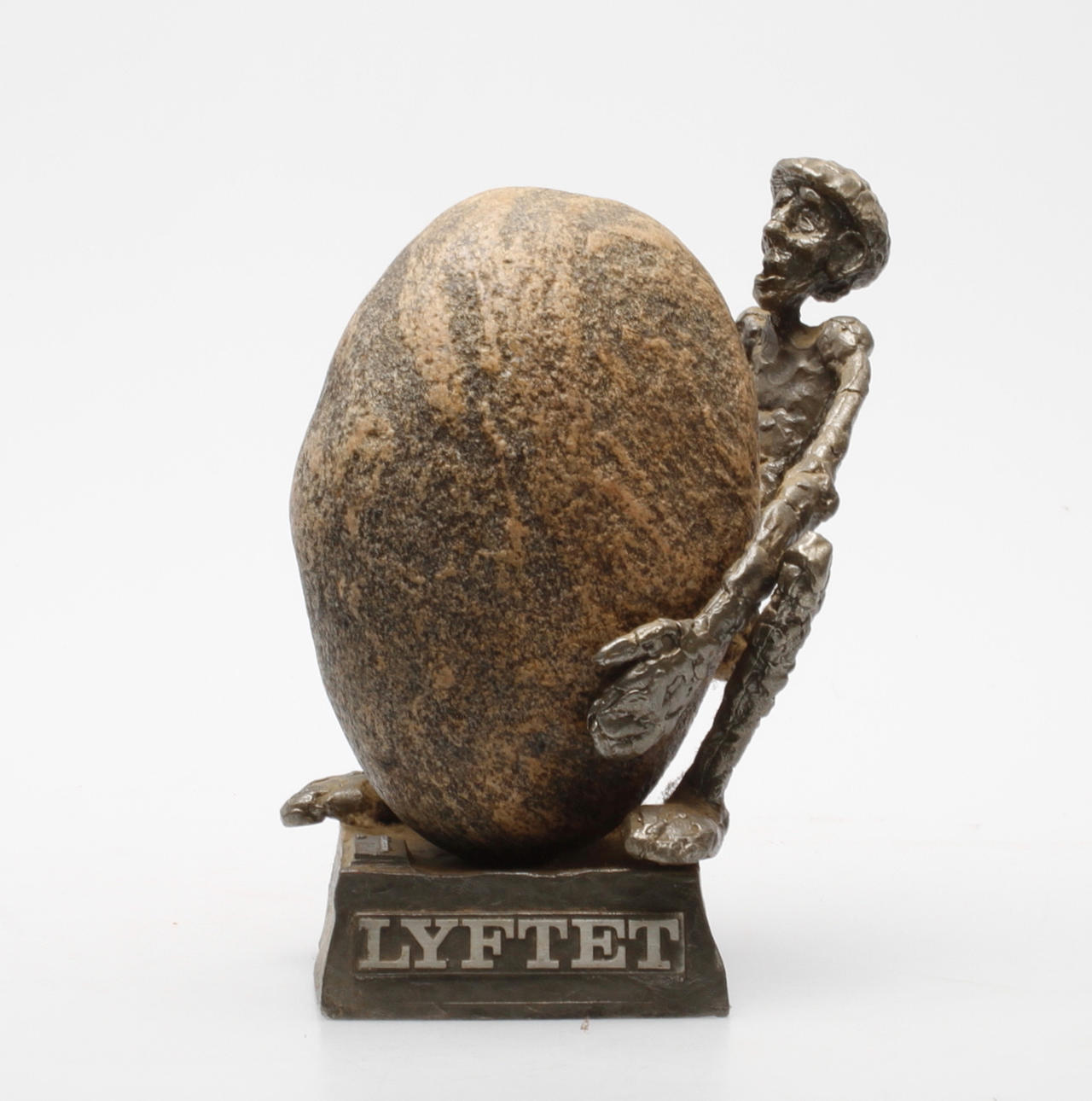 HENRY GUSTAFSSON. skulptur, "Lyftet", sten och tenn, signerad, Vimmerby.