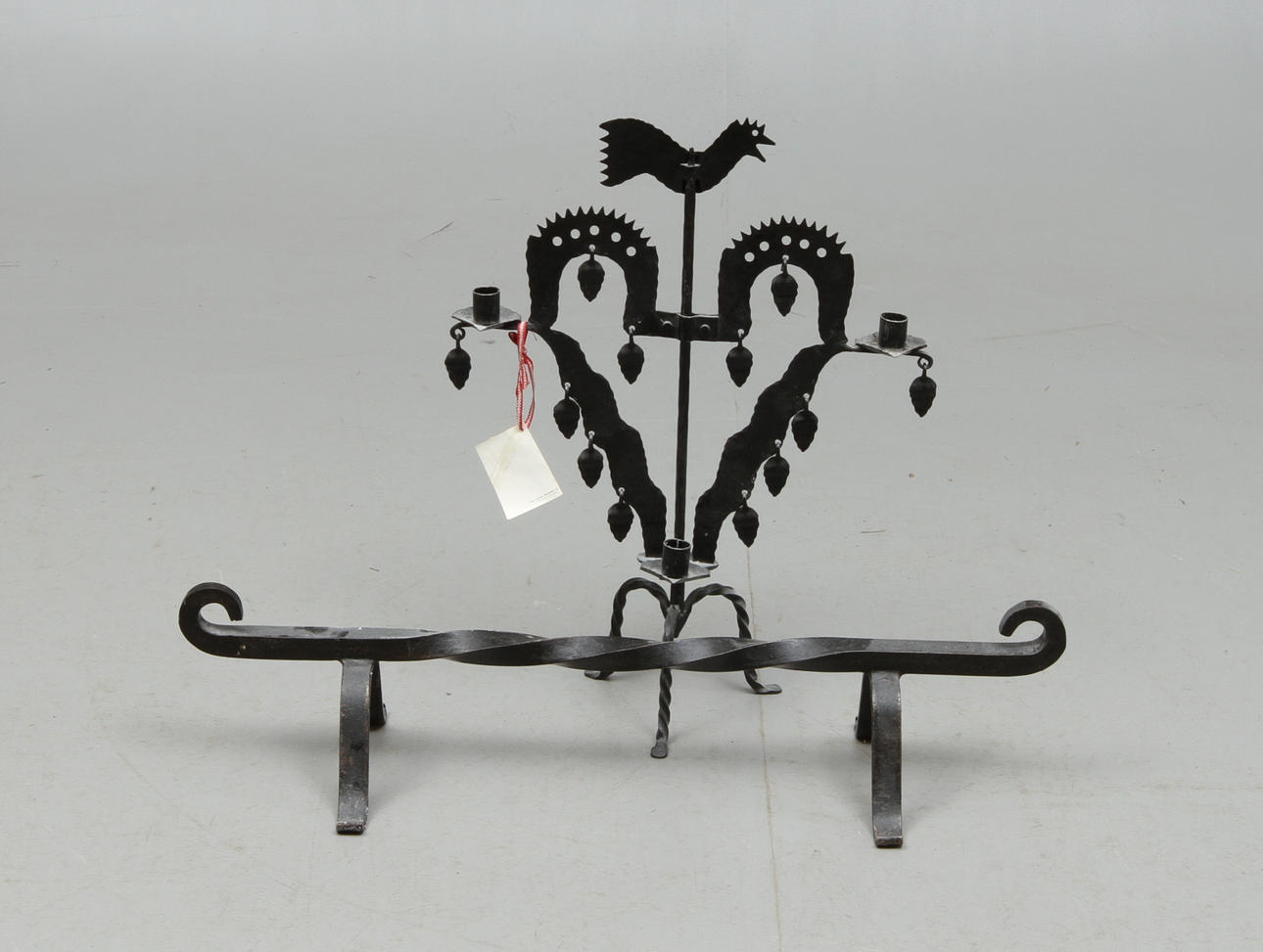 TUPPLJUSSTAKE, ELDHUND, smide, 1900-tal.