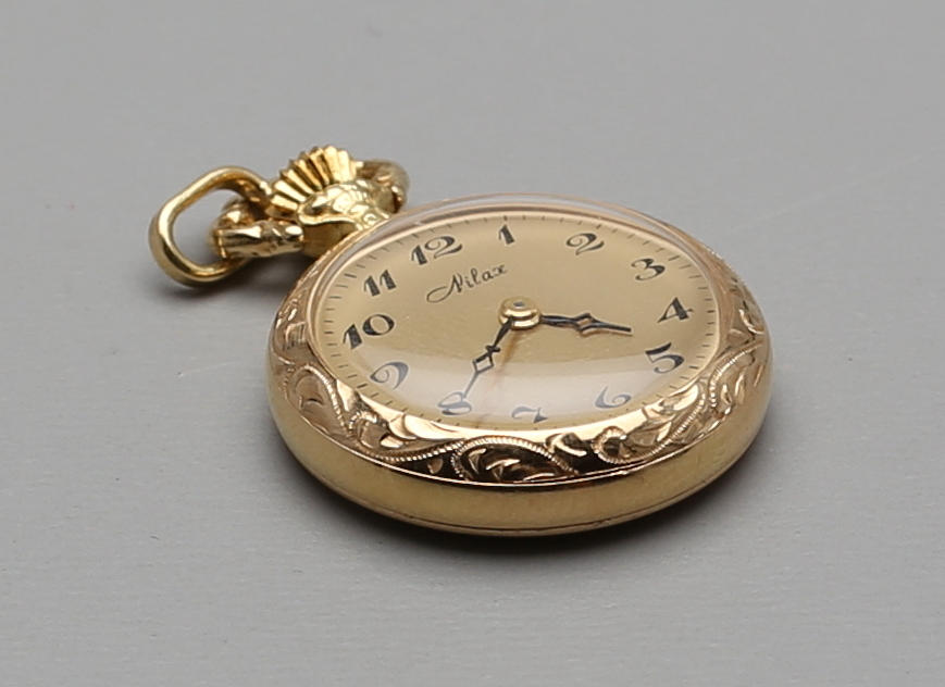 FICKUR, Nilax, 18k guld, total vikt 11 g.