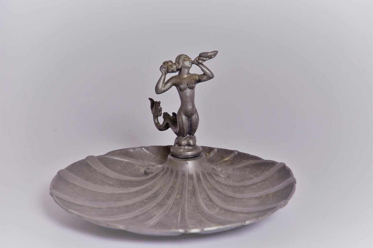 Art deco-stil i tin.