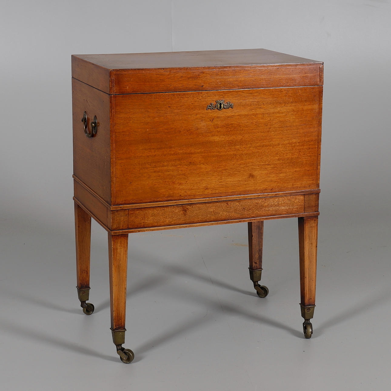 EN GEORGE III MAHOGNY CELLERETTE.