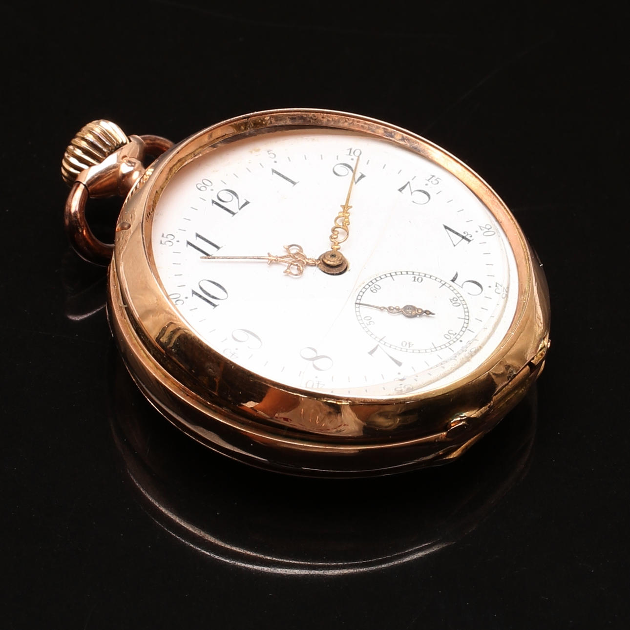 POCKET WATCH in 14K red gold.