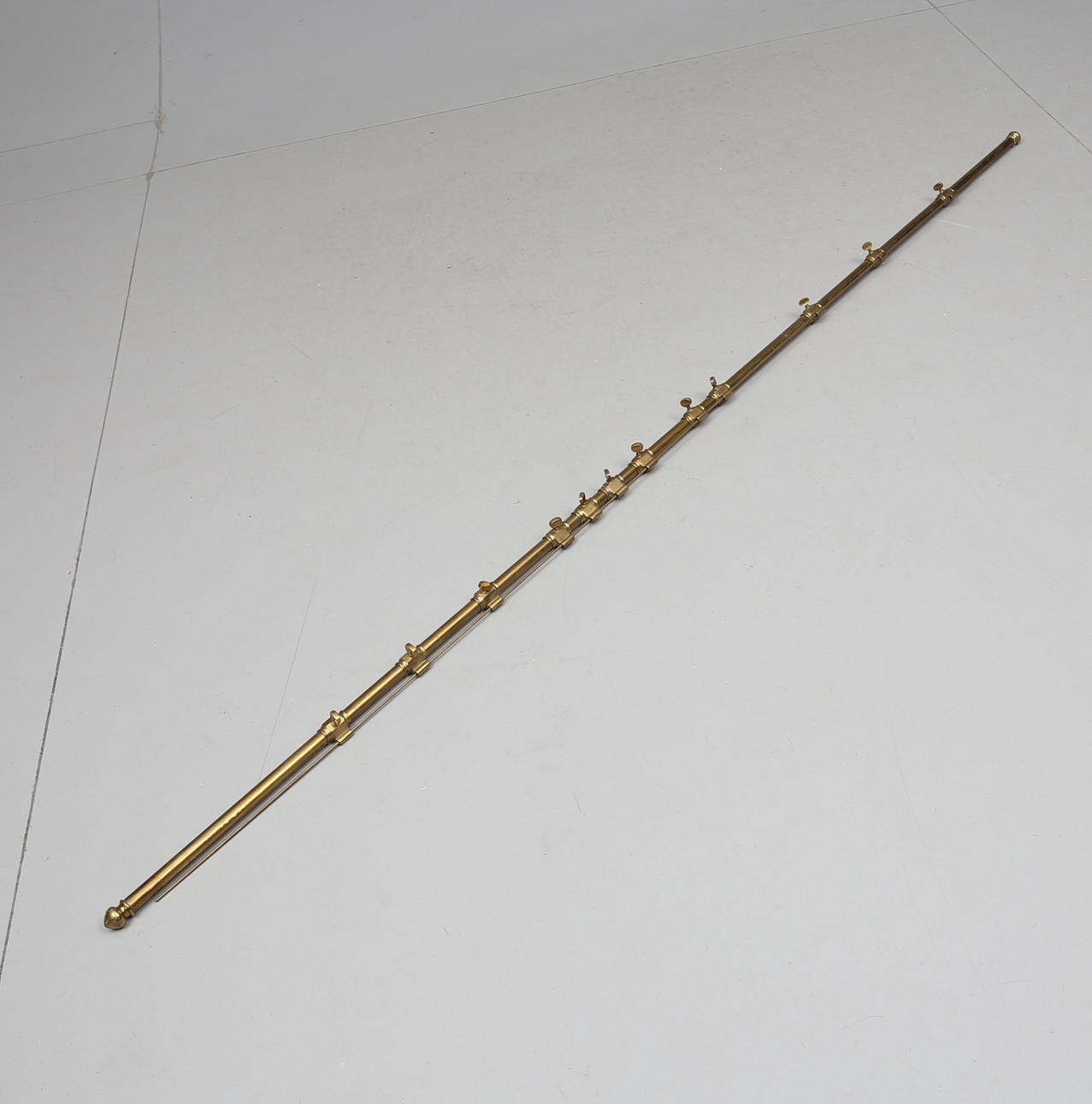 Gardinenstange, Messing, 20. Jahrhundert.