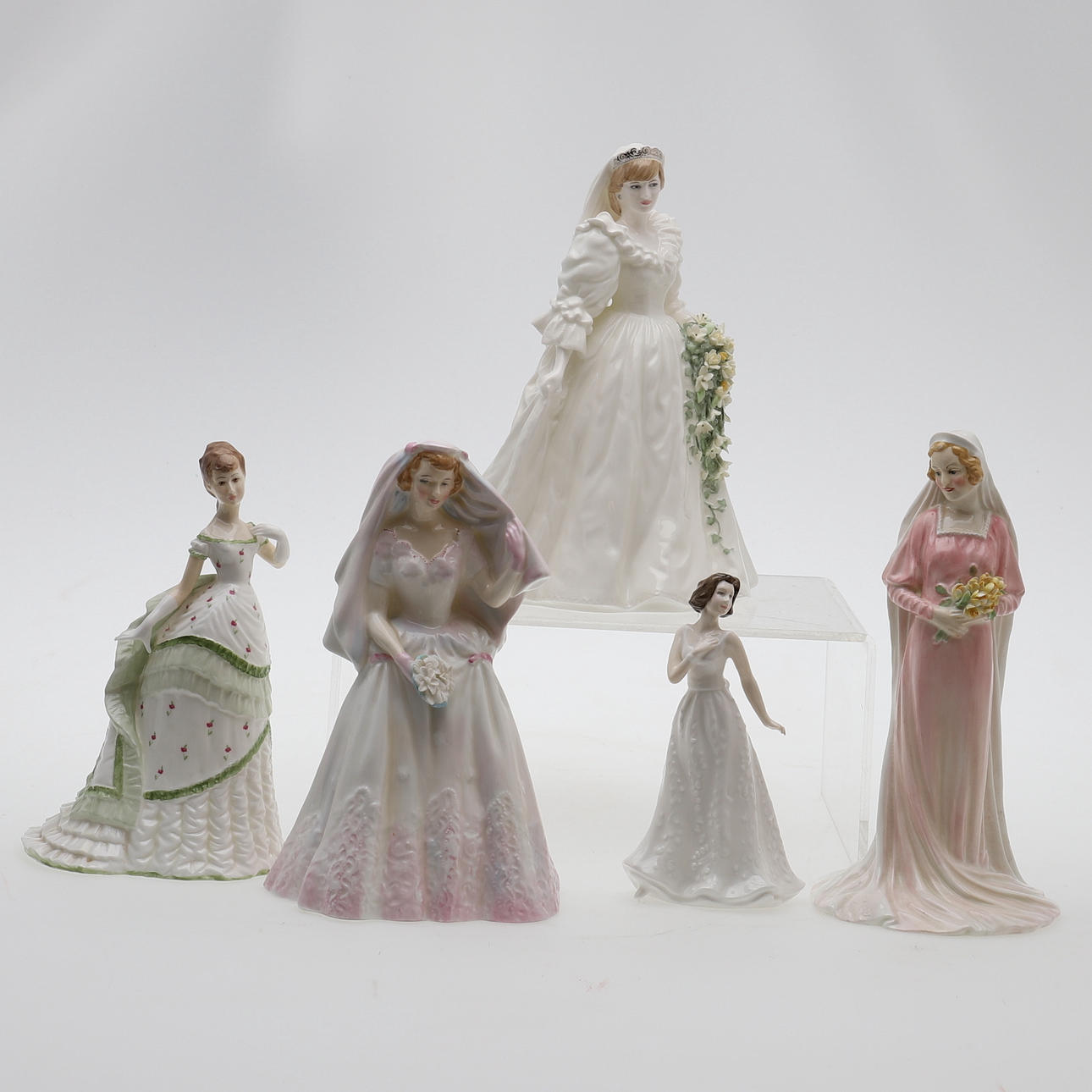 A COALPORT FIGURE & FOUR OTHER FIGURES.