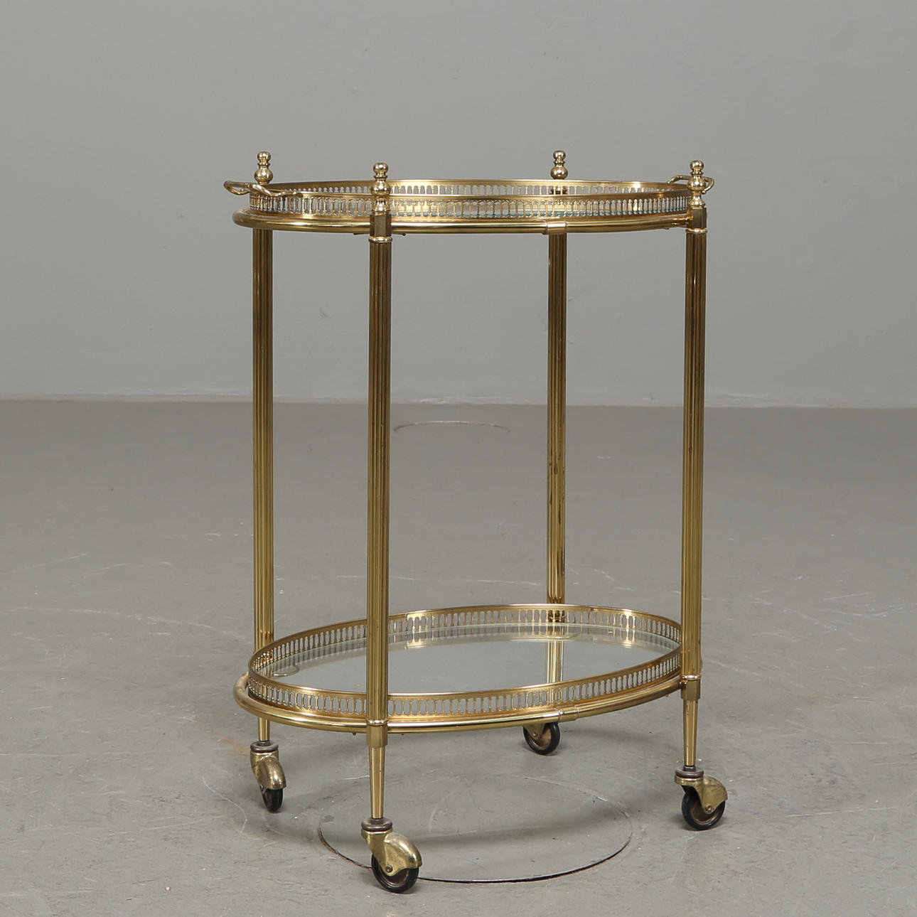 SERVING TABLE, brass/glass, on wheels, late 20th century.