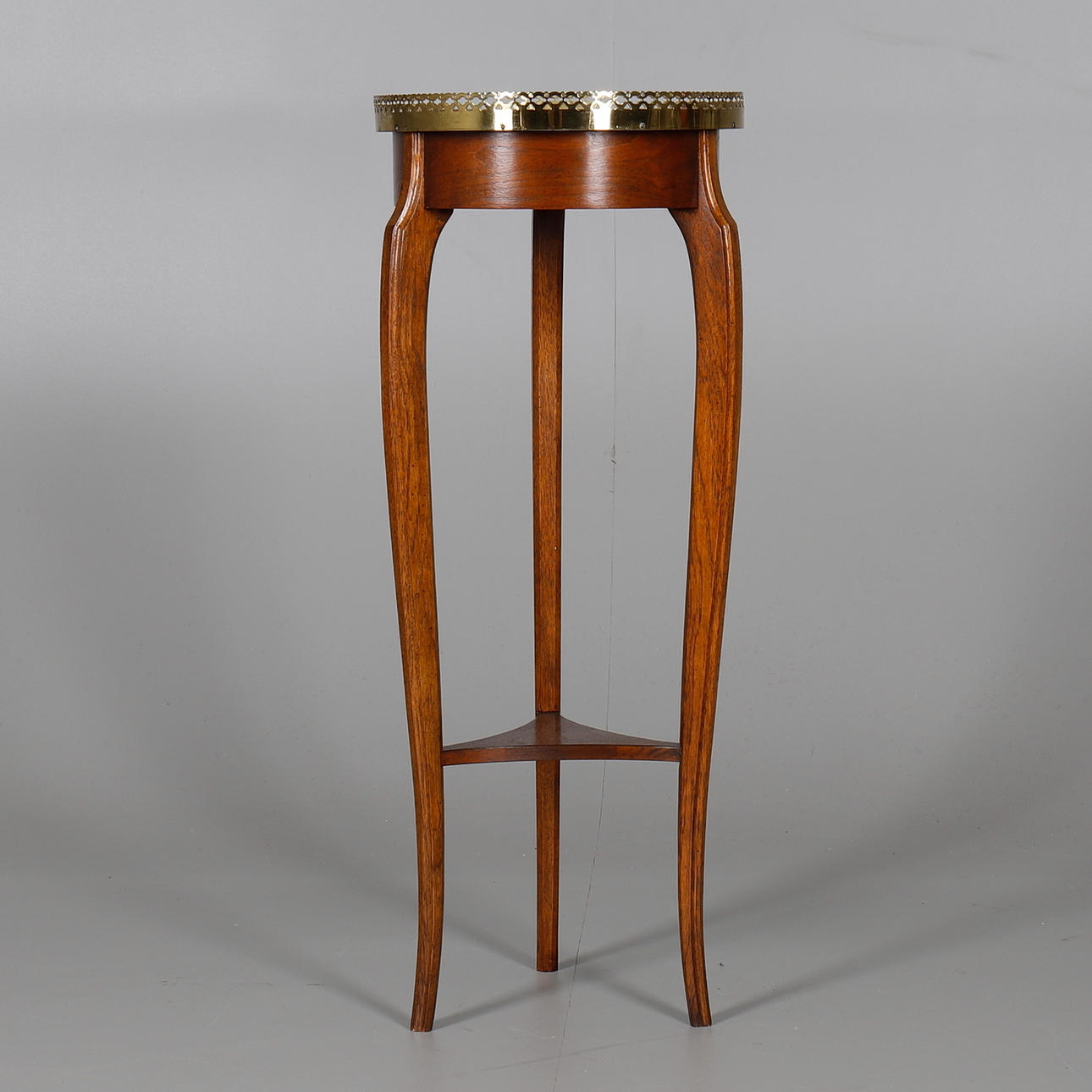 A WALNUT OCCASIONAL TABLE IN LOUIS XV STYLE.