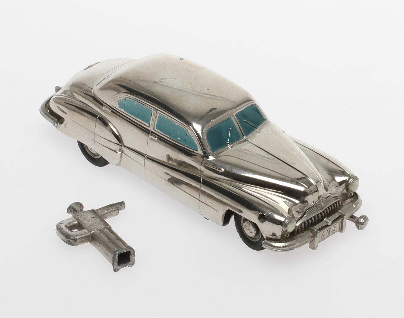 MODELLBIL PRÄMETA BUICK 405 med originalnyckel. Made in Germany Brit. Zone.
