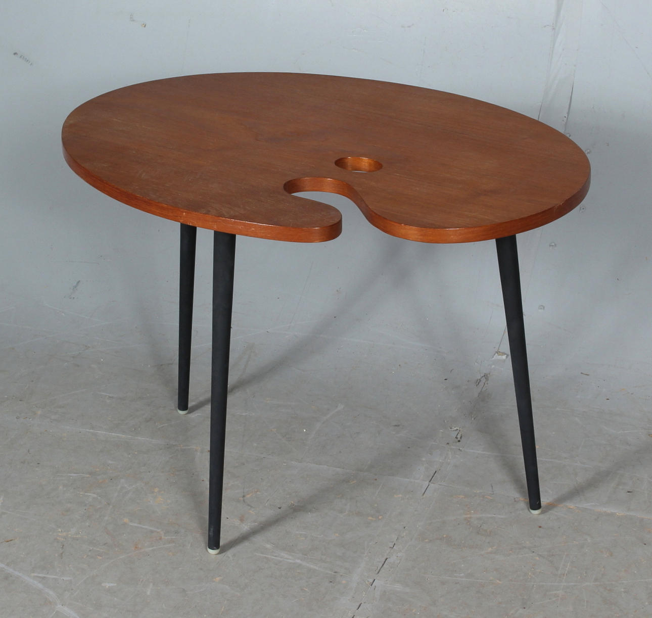 TABLE, "palette", Teak veneer, mid-20th century.