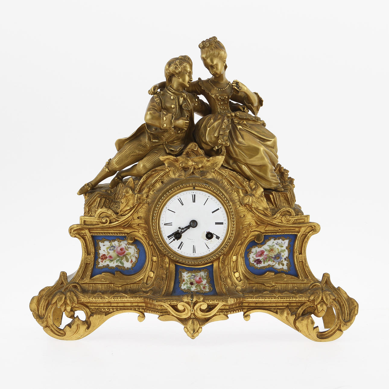 BORDSUR, förgylld brons och bemålat porslin. Paris, nyrokoko 1800-talets slut.