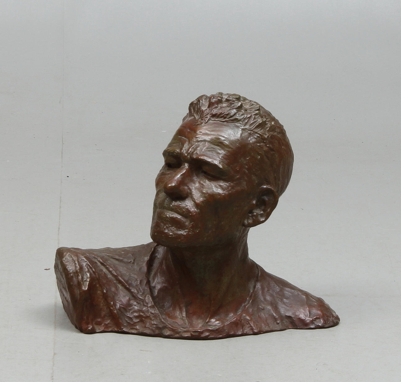 ARON JERNDAHL. Mansbyst, "Mask ur livets karneval", brons, signerad.