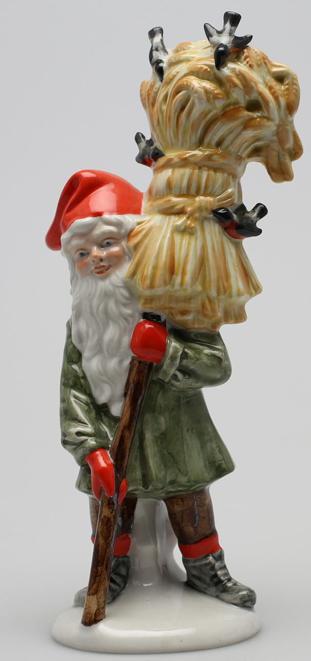 FIGURIN. Porslin, Tomte med halmkärve. 1900-tal.