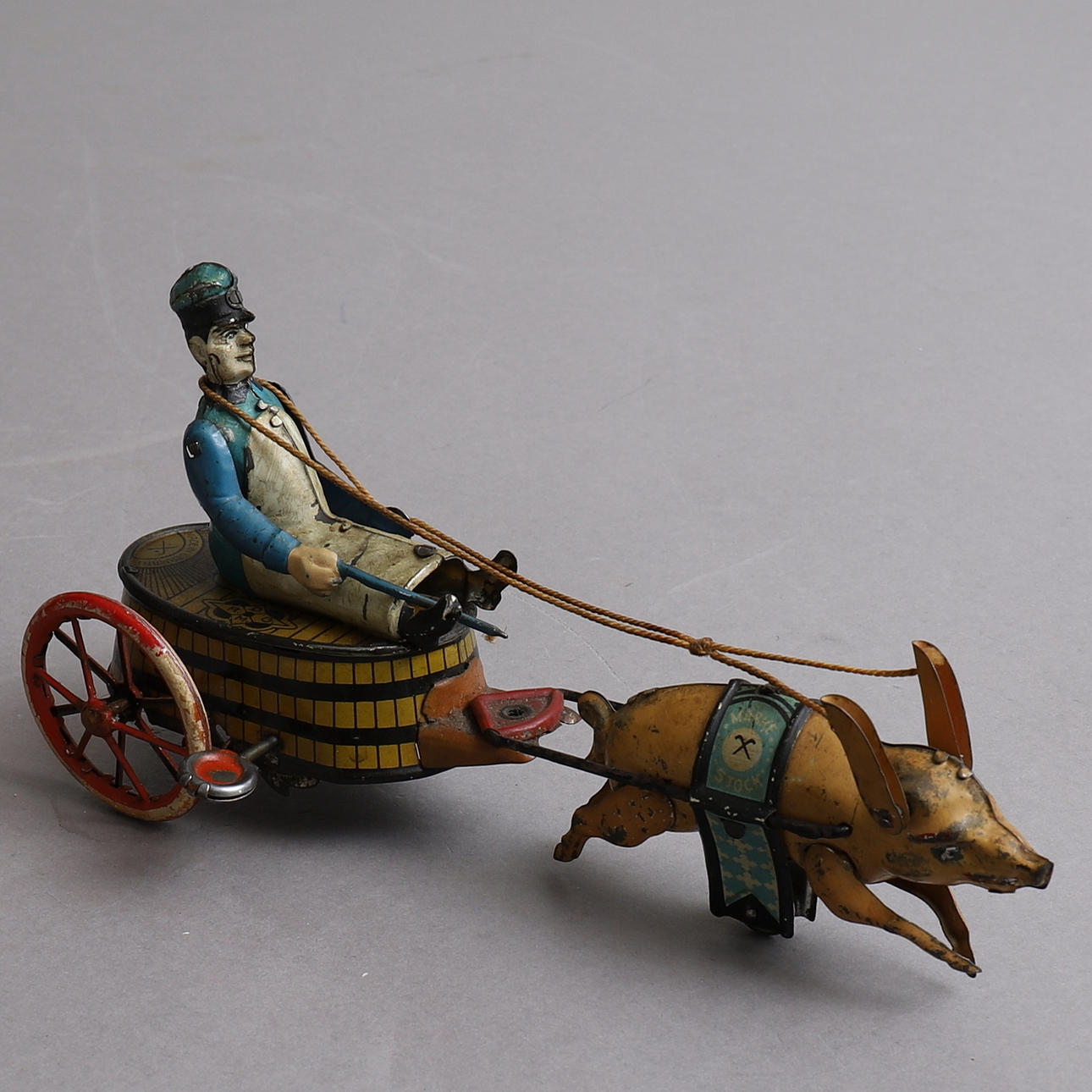 MECHANICAL TOY, driver and pig, GDRM, Germany.
