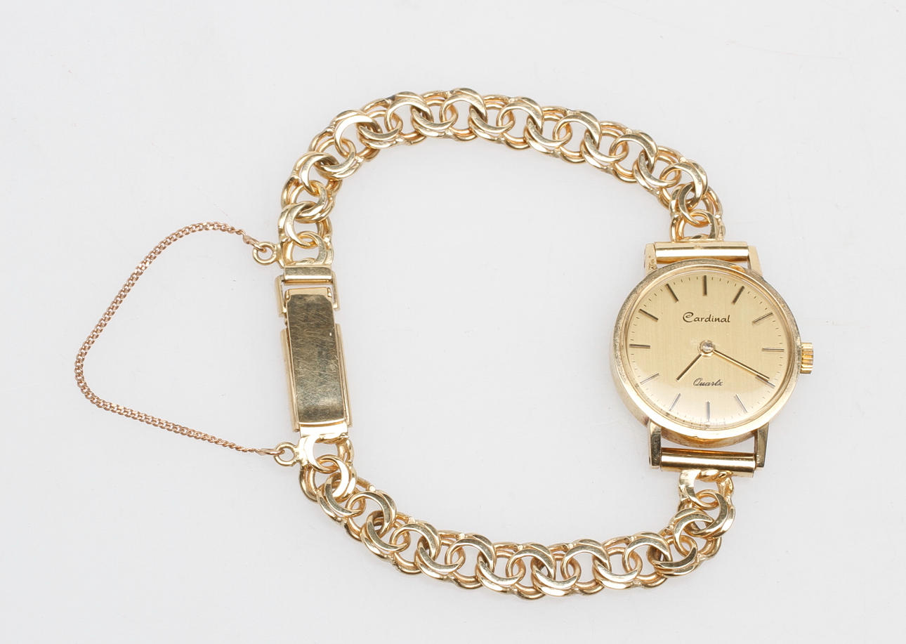 DAMUR CARDINAL med BISMARCKSARMBAND, 14k guld, total vikt ca 22,4 gr.