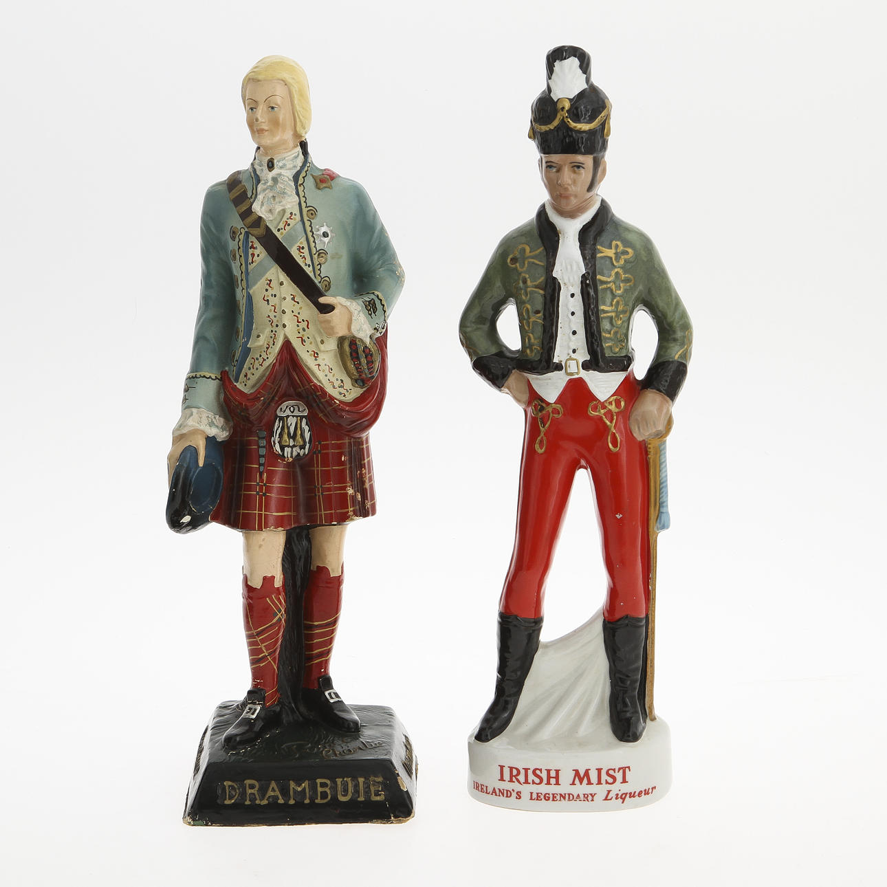 REKLAMFIGURER, 2 st, porslin samt papiermaché, Drambuie samt Irish Mist.