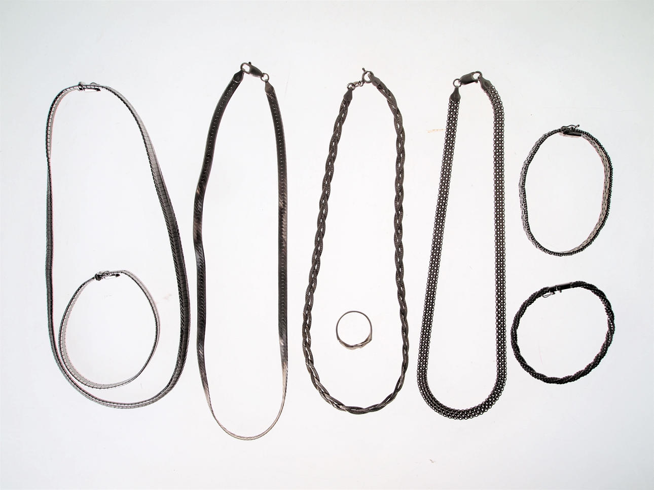 SILVERSMYCKEN, halsband, armband och ring.