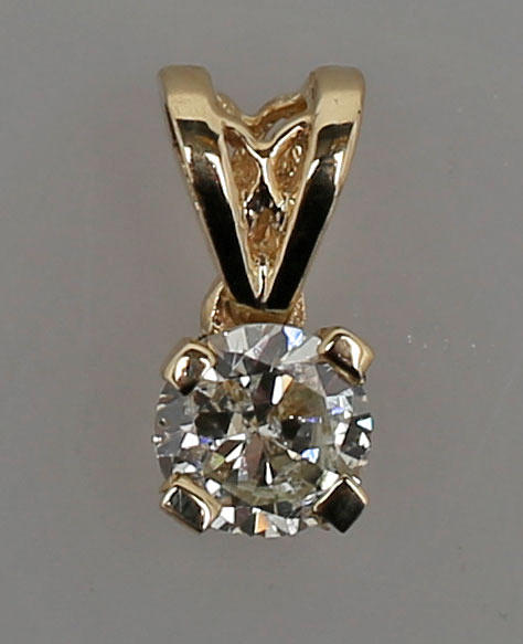 ENSTENSHÄNGE, rödguld, ca 0,36 ct, 14 K.