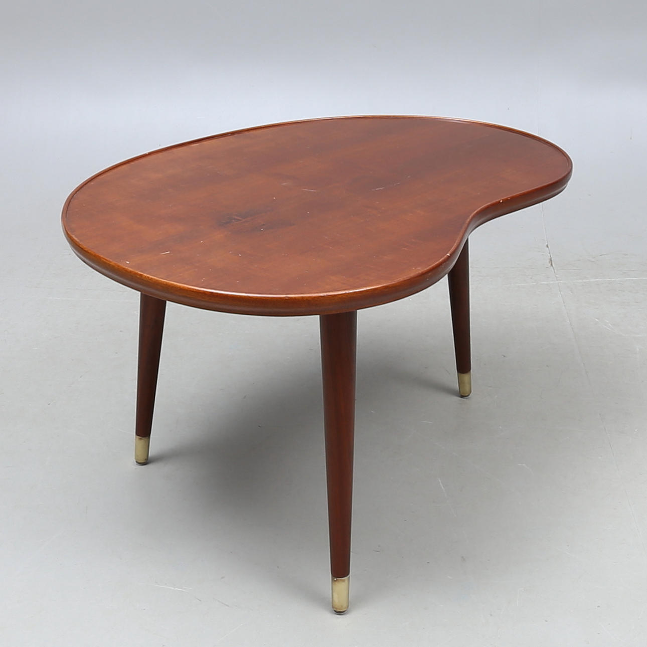 COFFEE TABLE, kidney shaped, circa 1950s.
