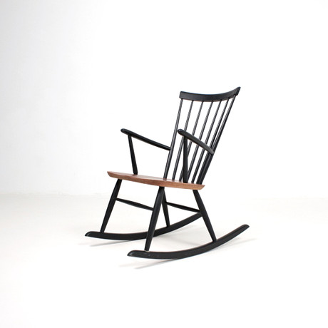 ROLAND RAINER (1910 - 2004). Rocking chair with rungs from the 1950s ...