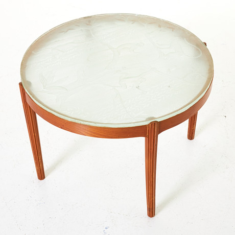 COFFEE TABLE, 1940s, raw glass top with etched decoration of climbing ...