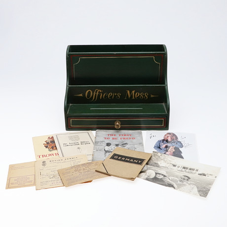 A PAINTED OFFICERS MESS STATIONARY RACK. Furniture - Other - Auctionet