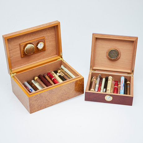 Two humidor cigar boxes with approx. 80 cigars, wood (2). Miscellaneous ...