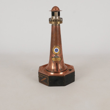 INSAMLINGSBÖSSA, i form av elektriskt fyrtorn 