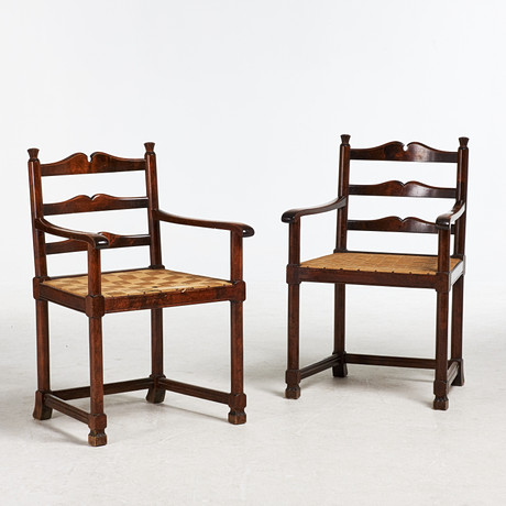 A pair of Swedish Grace chairs, 1930s/40s, frame in mahogany, saddle