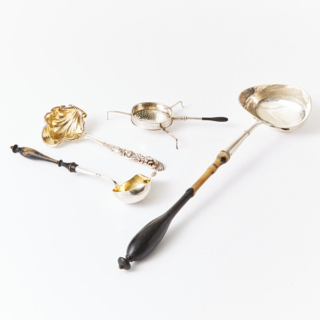 A pair of soup spoons, two silver tea spindles, 19th century, soup ...