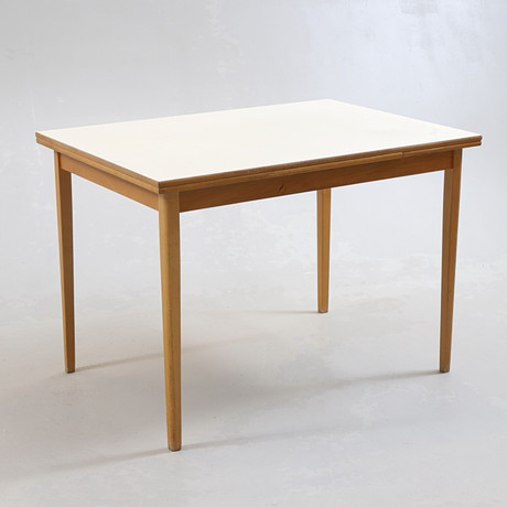 A dining table, perstorp plate, beech leg stand, second half of the ...