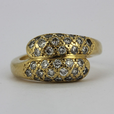 GOLD AND DIAMOND CROSSOVER RING. Jewellery & Gemstones - Rings - Auctionet