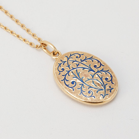 LOCKET with photo hide, and CHAIN, 18k gold and enamel. Total weight ...