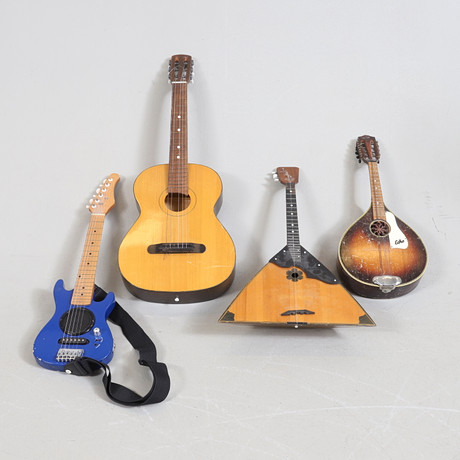 A set of four 20th century musical instruments. Collectables - Musical ...