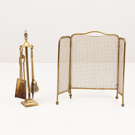 A 6-piece brass fireplace set, fire rack and spark arresters, first ...