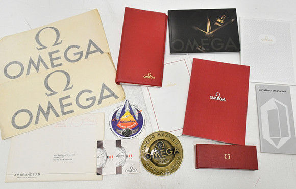 Es Omega. lote con catálogos de material de tienda, manuales de usuario ...