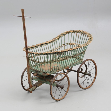 A STROLLER WITH A WICKER BED, early 20th century. Miscellaneous ...