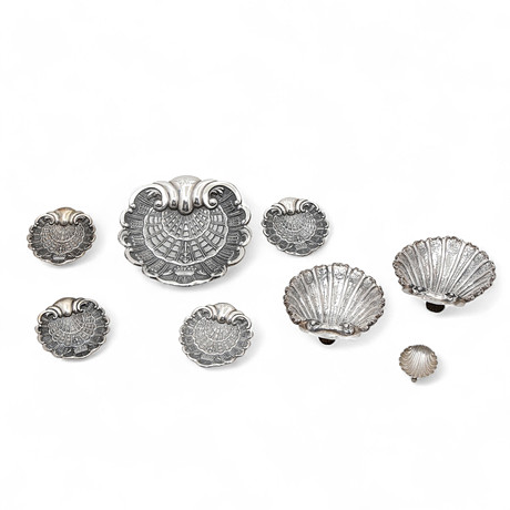 Set of eight silver shells, early decades of the 20th Century. Silver ...