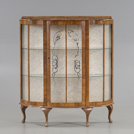 A Walnut England display cabinet, first half of the 20th century ...