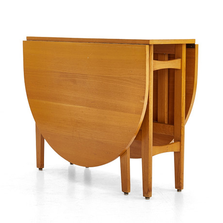 A SLAG TABLE, second half of the 20th century, veneered in beech ...