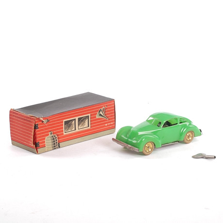 A toy car, “Panther”, plastic and sheet metal, clockwork, original ...