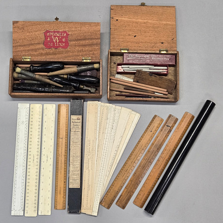 A GROUP OF VINTAGE RULERS AND PRINTING RELATED ITEMS. Miscellaneous ...