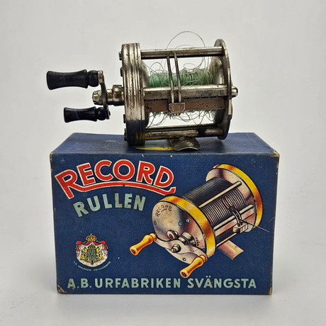 A fishing reel and fishing rod with accessories, Abu-matic 160 and