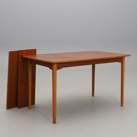 A dining table by Hugo Troeds, Bjernum, 1950s, with tray marking ...