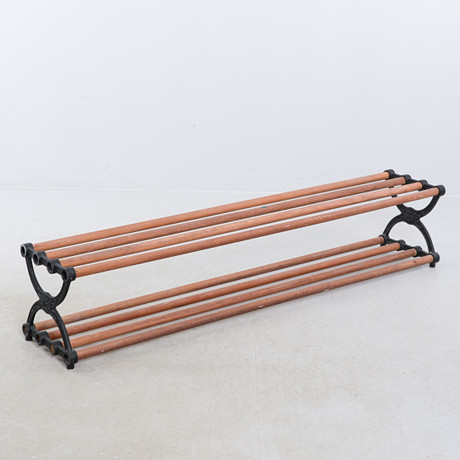 A LONG SHOE RACK, wrought & wood, second part of the 20th century ...
