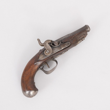 A pocket pistol, with a clasp, about the middle of the 19th century ...