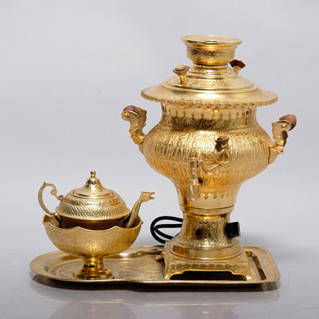 SCANDIA GOLD. Three gold plated metal trays, end of 20th century